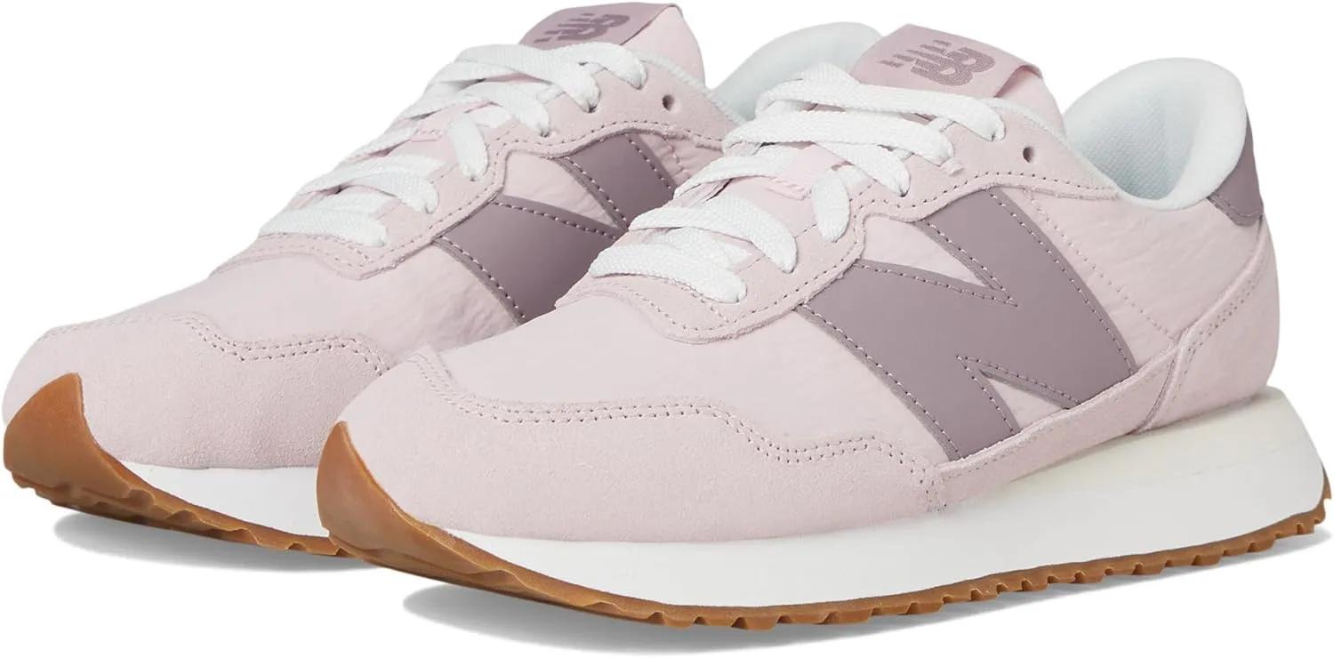New Balance Women's 237 V1 Sneaker, Pink, 10.5